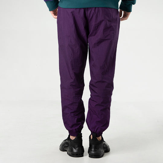 Nike MENS Sportswear Logo Print Tat Ankle Banded Sports Pants Purple AR9895-525