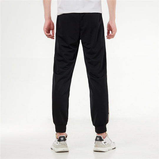 Men's adidas Contrasting Colors Stripe Knit Bundle Feet Sports Pants/Trousers/Joggers Black H48439